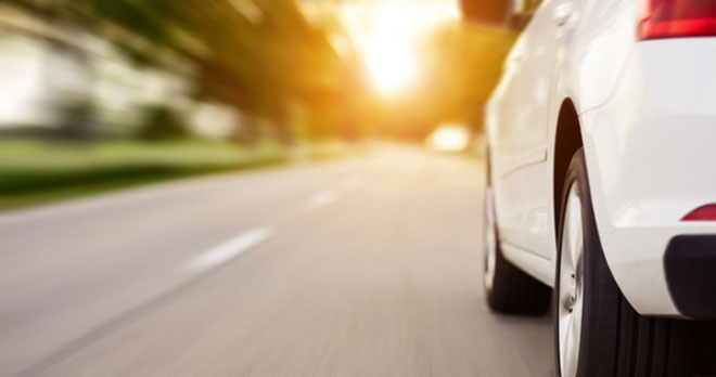 a car driving down a road